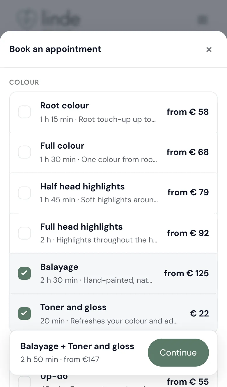 ChairIt booking on a phone: choosing treatments
